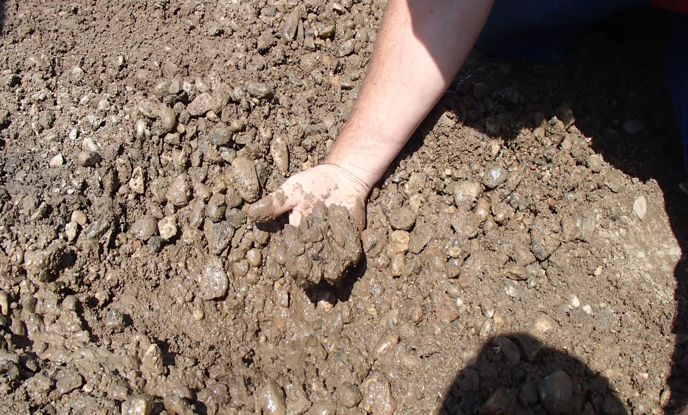 15-23 inches of pit run material is placed