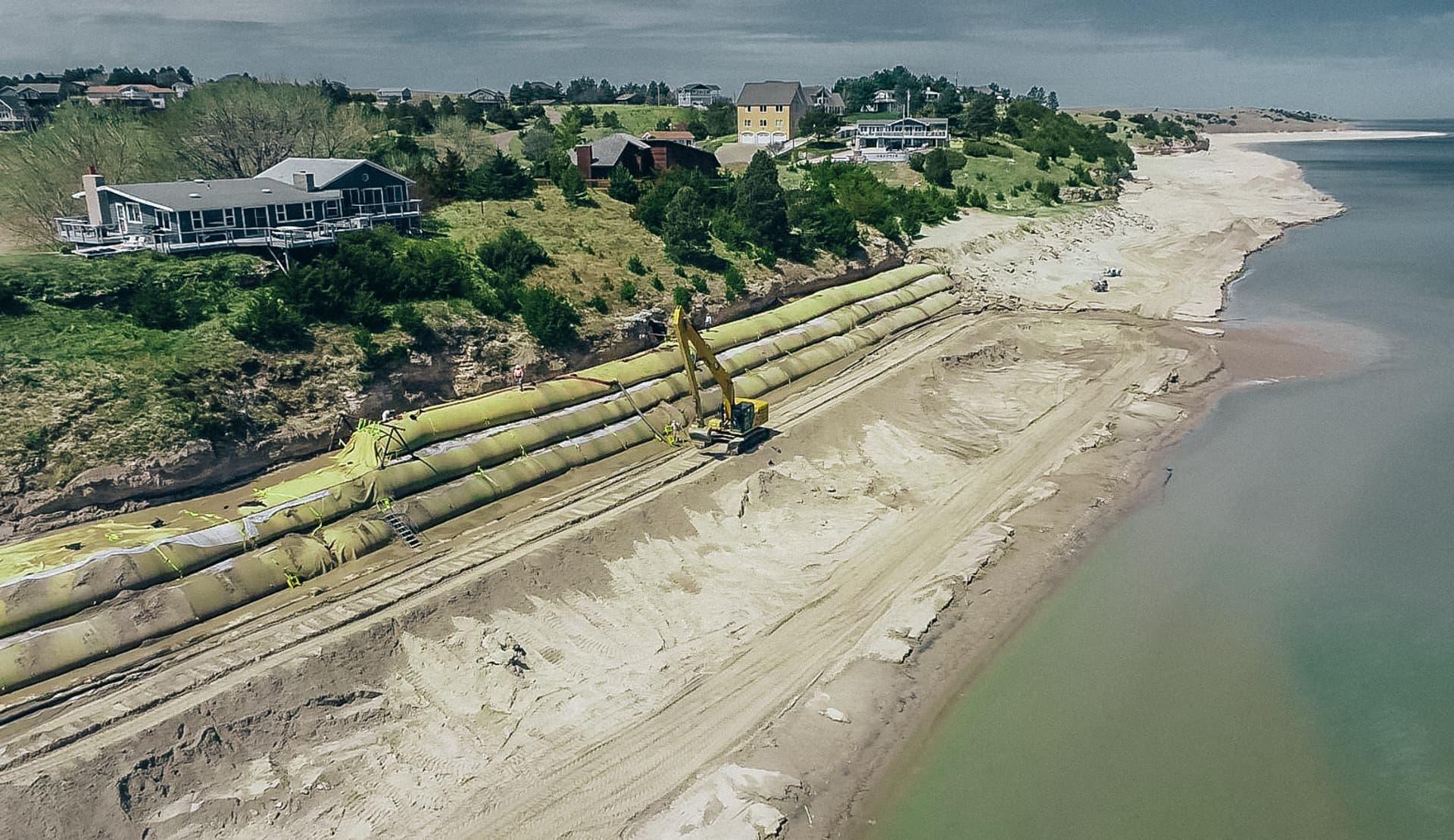 GEOTUBE TC1200MB units were selected to provide erosion control because they can be filled using on site materials, making them a more efficient solution than importing stone.