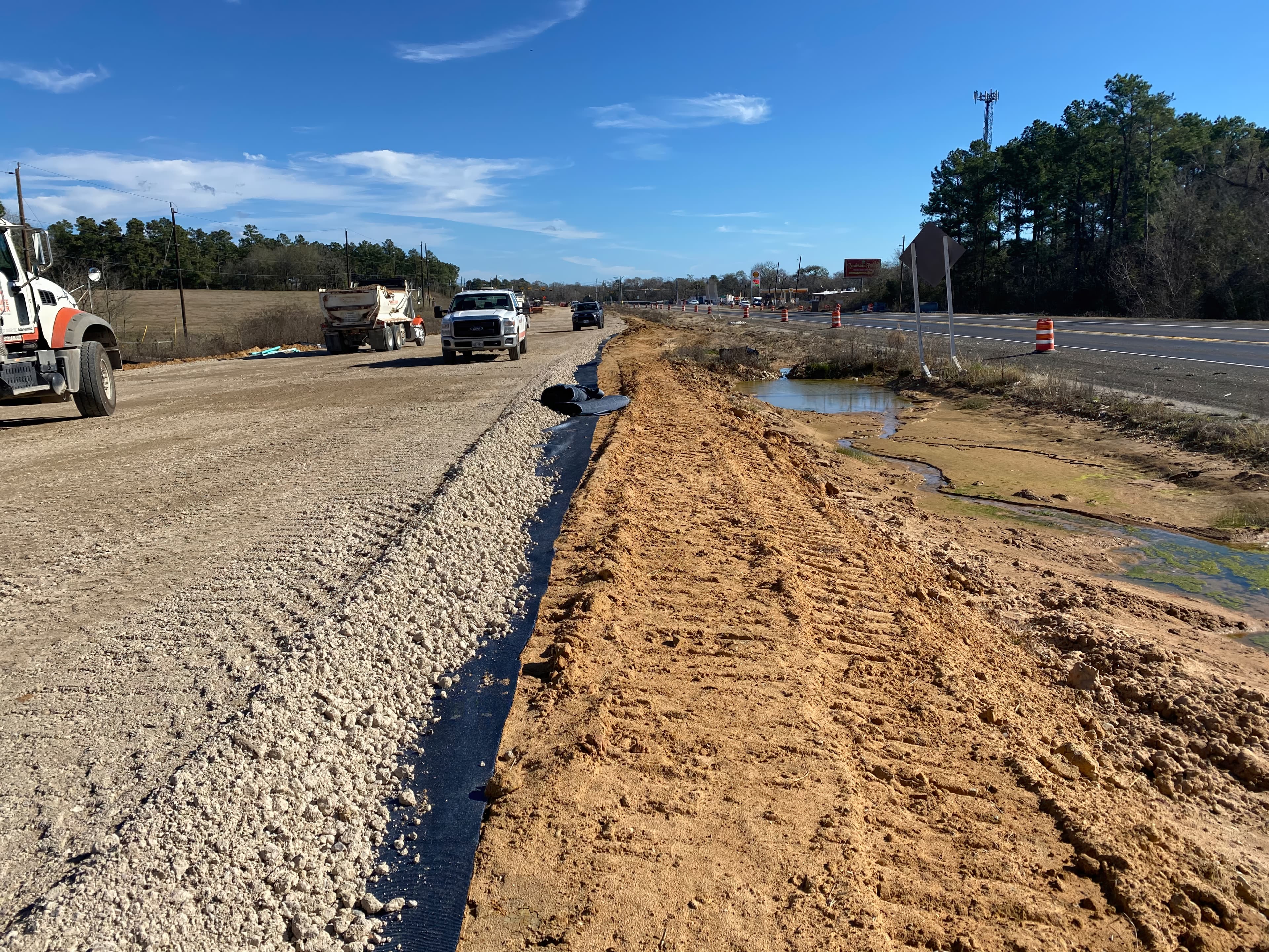 The saturated subgrade consisted of expansive clay soils with a very low CBR of 1.5%.
