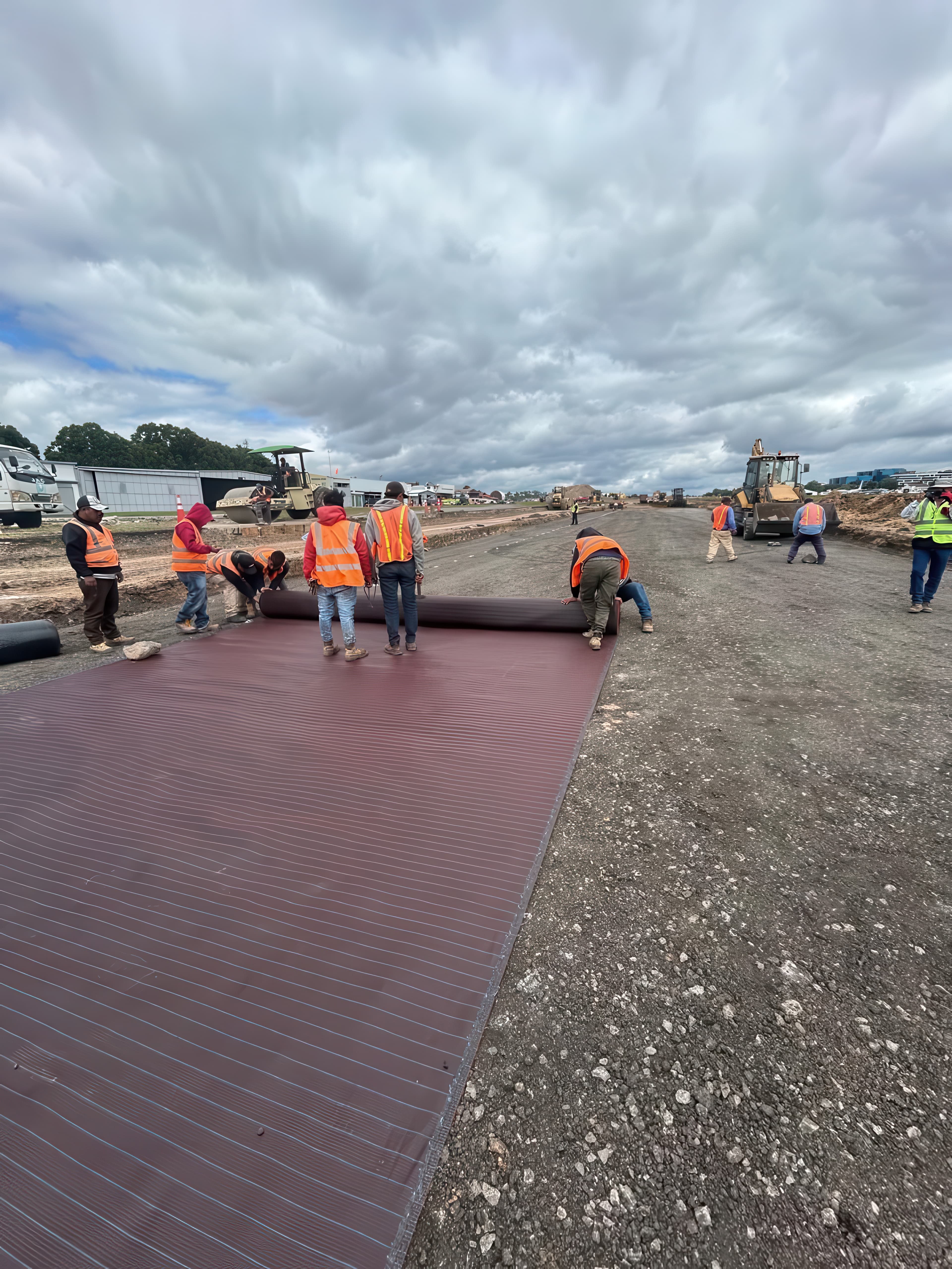 MIRAFI® RS580i was tensioned and installed directly over the prepared subgrade to provide high-modulus reinforcement and load distribution.